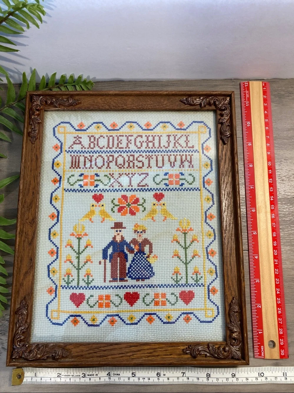 Vintage Framed Cross Stitch Sampler With Alphabet Flowers Birds And Couple